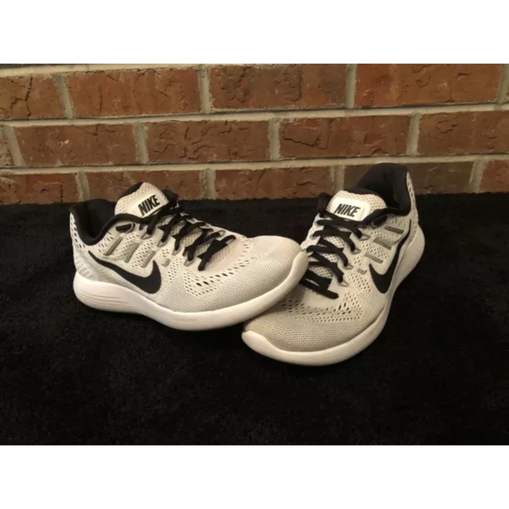 White Nike running shoes